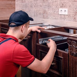 Cabinet repair and handle installation in Macomb kitchen